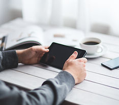 Working Coffee with hands holding mobile phone