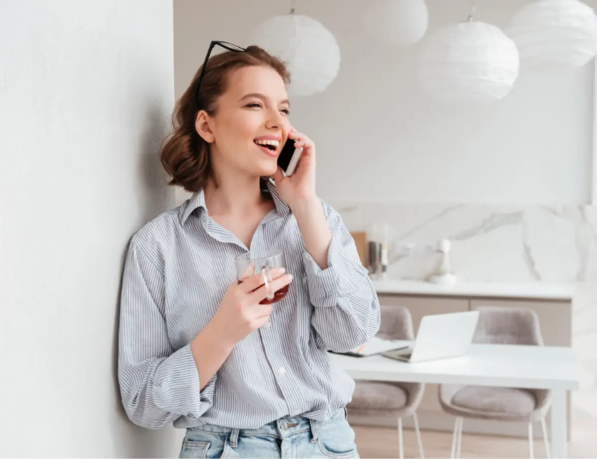 portrait-of-happy-excited-woman-talking-on-mobile-phone_edited_edited_edited_edited.webp