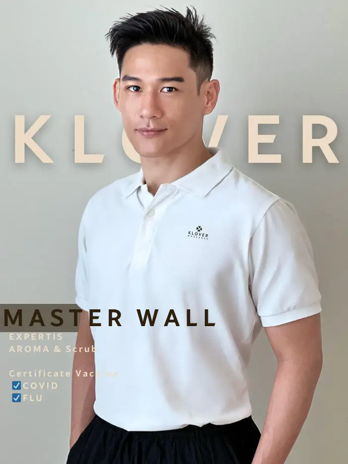 Wall in a white shirt and black shorts is featured posing for the cover of a magazine