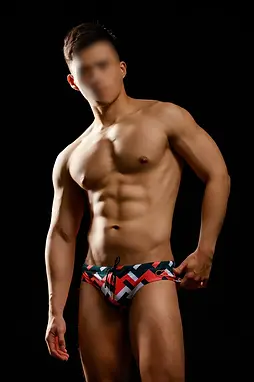 Captain Taipei gay massage Masseur Victor. showing his muscular body in swimwear.