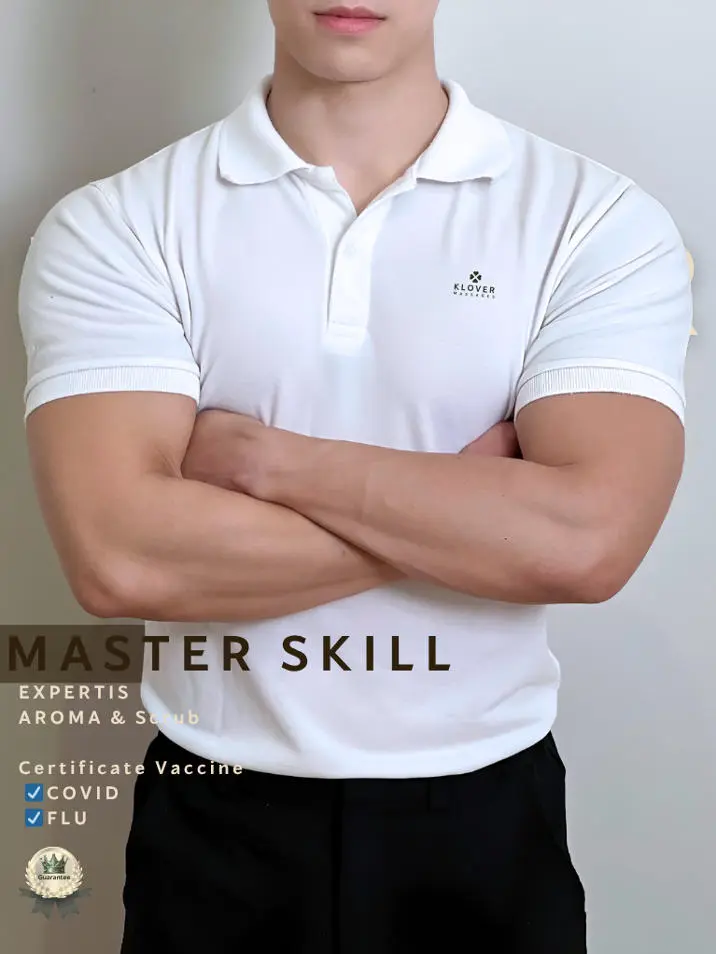 Skill in a white shirt and black pants stands, presenting a neat and professional outfit