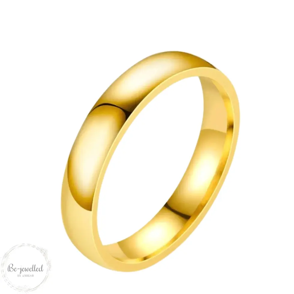 Gold minimalist band ring close up
