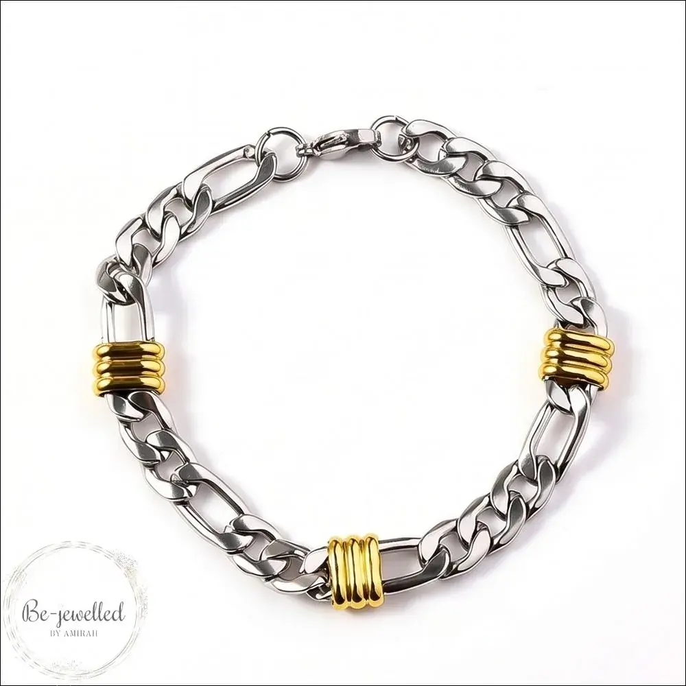 Men’s silver Cuban link bracelet with gold accent rings on white background