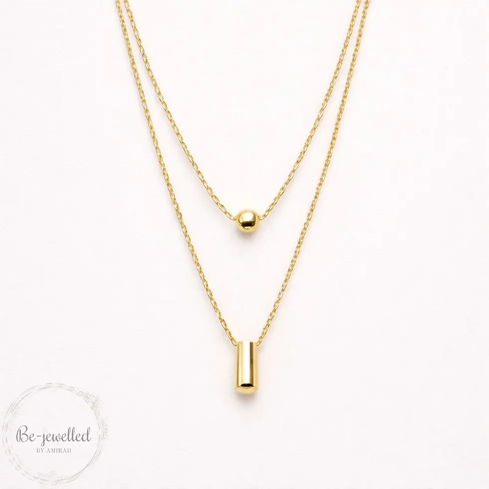 Thumbnail: Double layer gold necklace on soft background