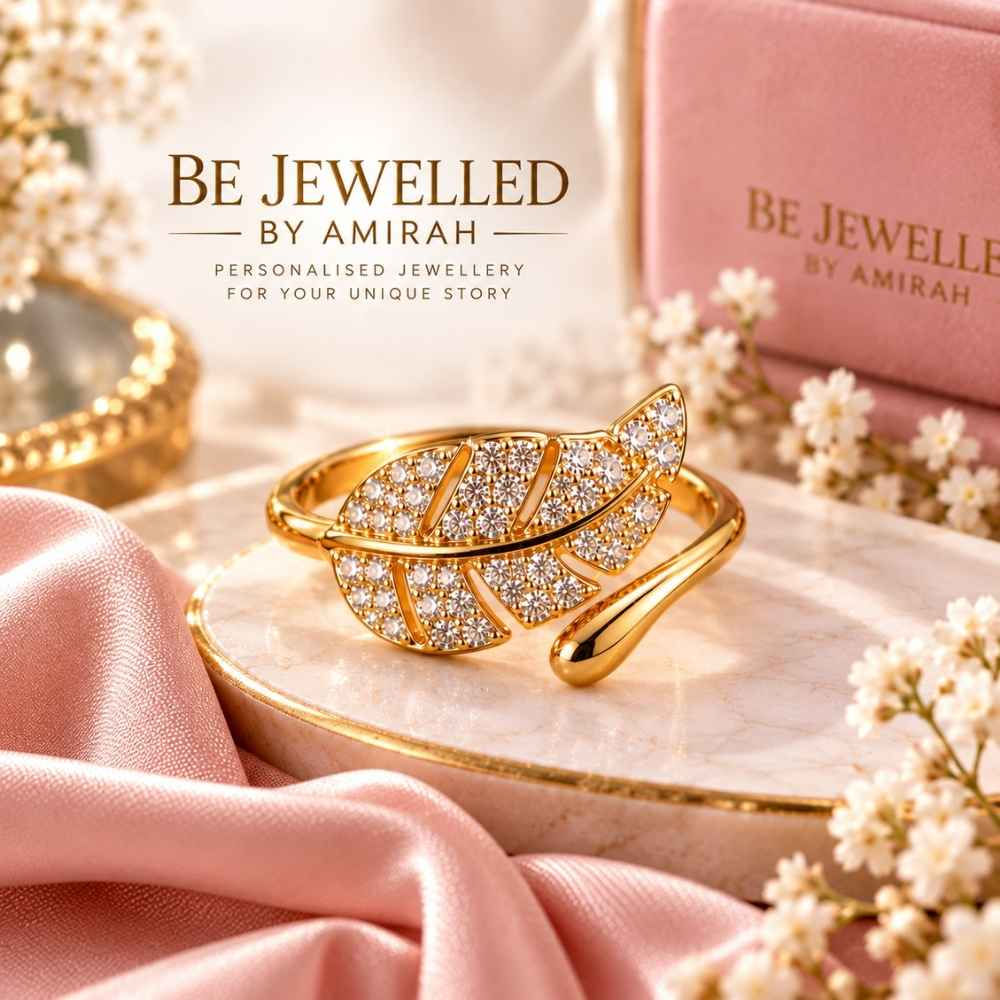 Golden Leaf Sparkle Ring with sparkling stones and polished gold-tone leaf design by Bejewelled By Amirah