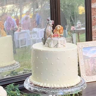 Lady and the Tramp cake topper at this Tucson area wedding venue