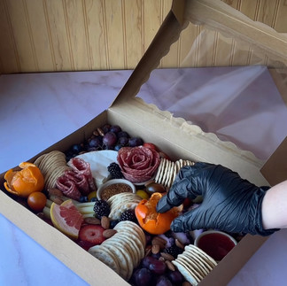 Charcuterie or grazing boxes for smaller portions on the go