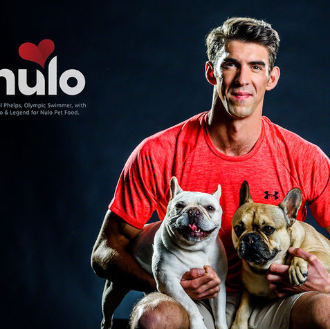 Michael Phelps with his two dogs