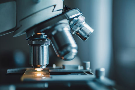 Close-up shot of microscope with metal lens at laboratory._edited.jpg
