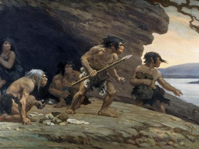 Grupo de hombres neandertales, cazadores-recolectores de