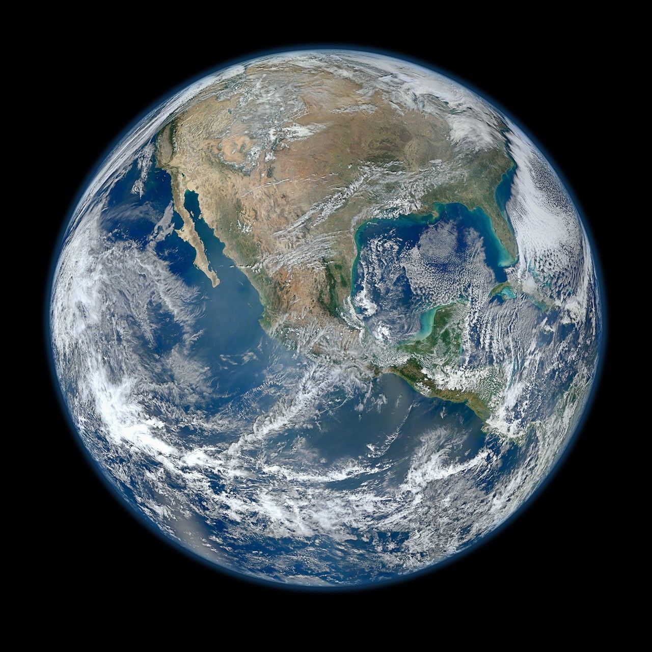 Blue Marble composite from Suomi NPP satellite observations showing Earth’s oceans, continents and clouds.