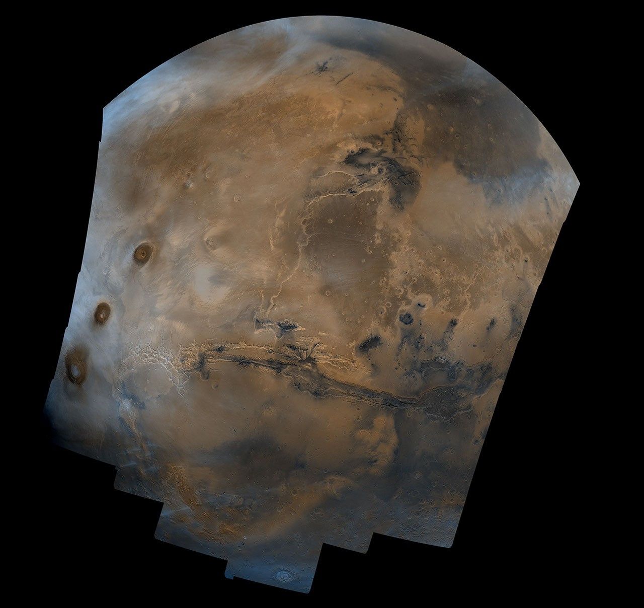 Color-enhanced Viking Orbiter mosaic of Mars showing Valles Marineris across the hemisphere.