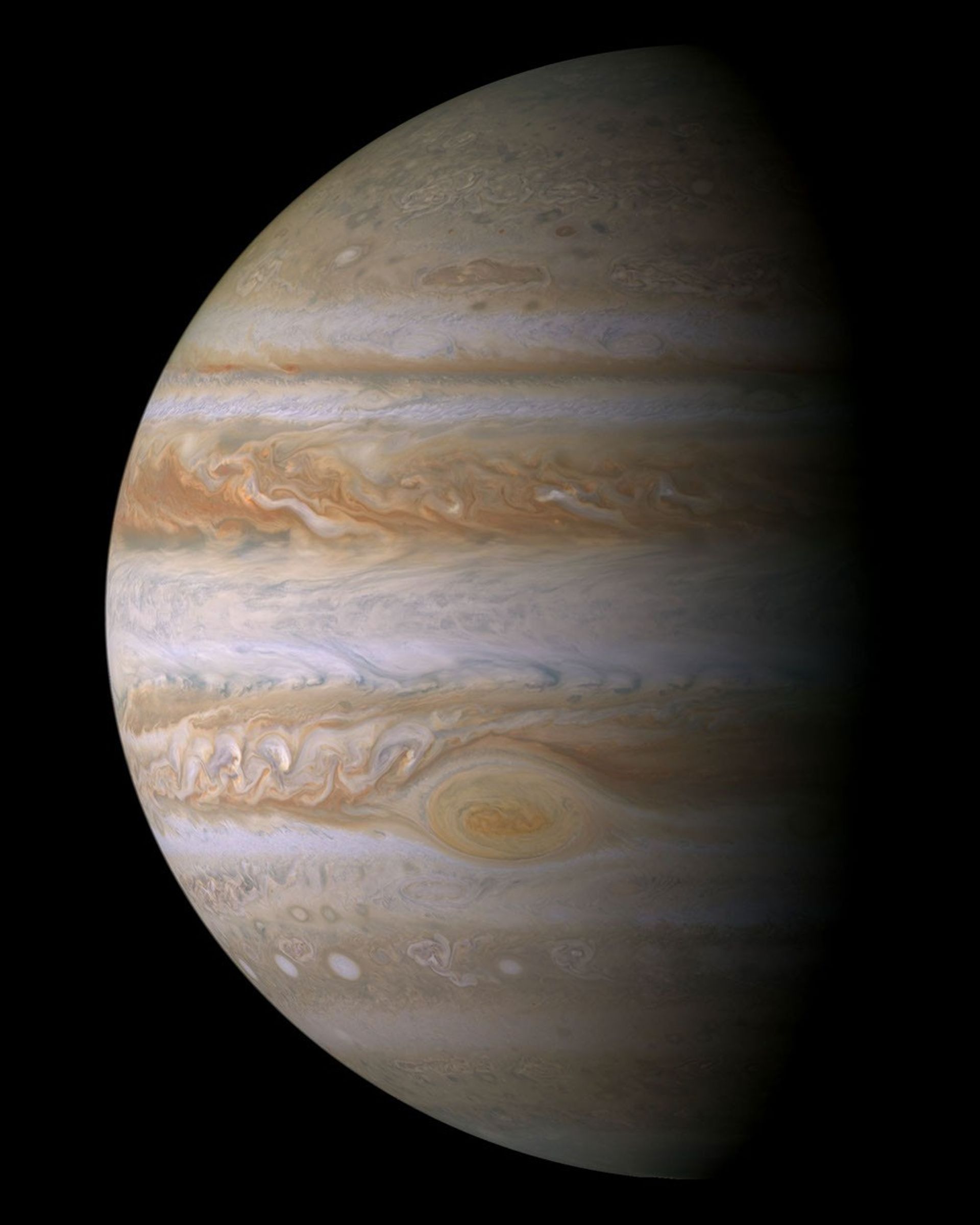 Cassini true-color mosaic of Jupiter showing cloud bands and the Great Red Spot.
