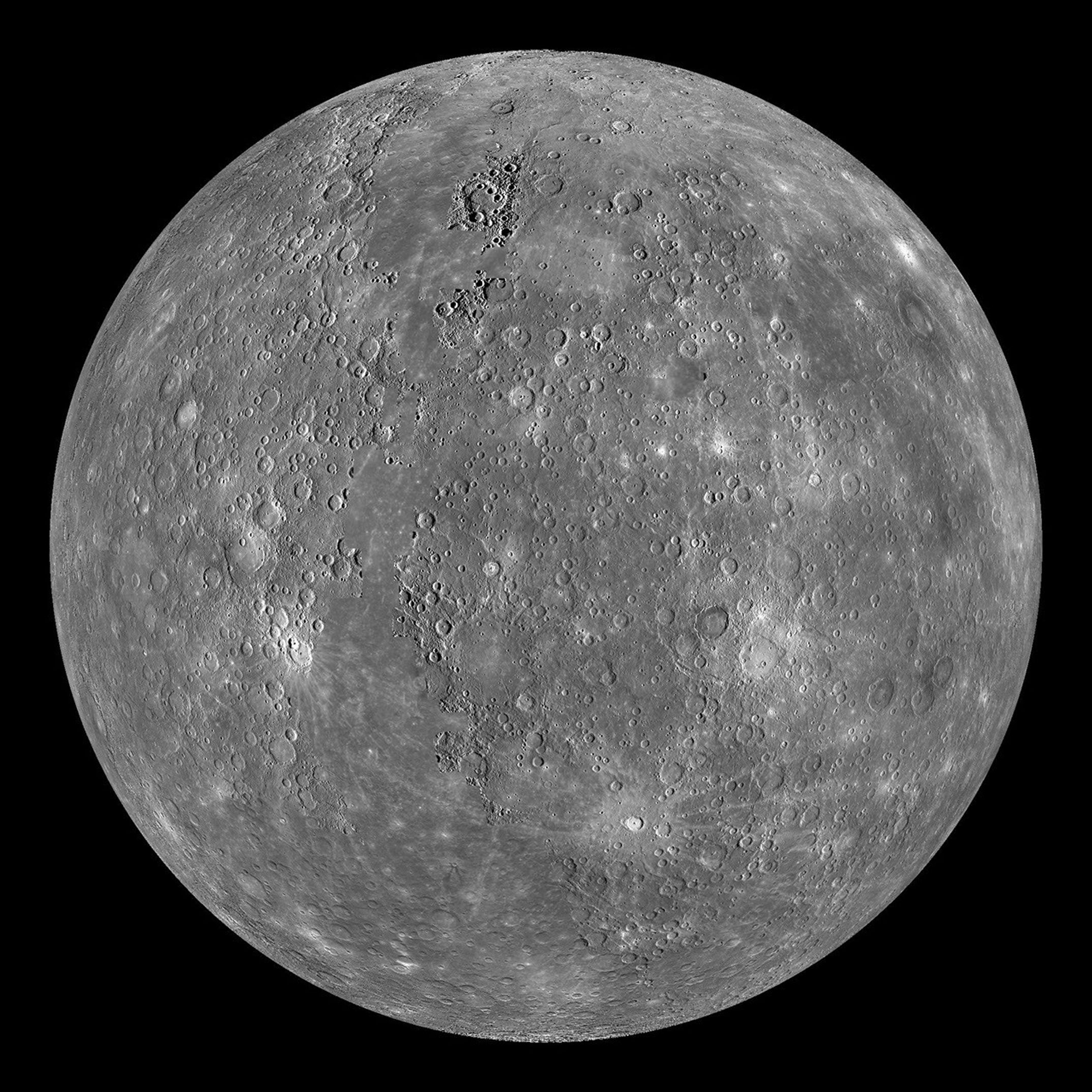 MESSENGER mosaic of Mercury showing gray cratered terrain and bright rays around Debussy crater.