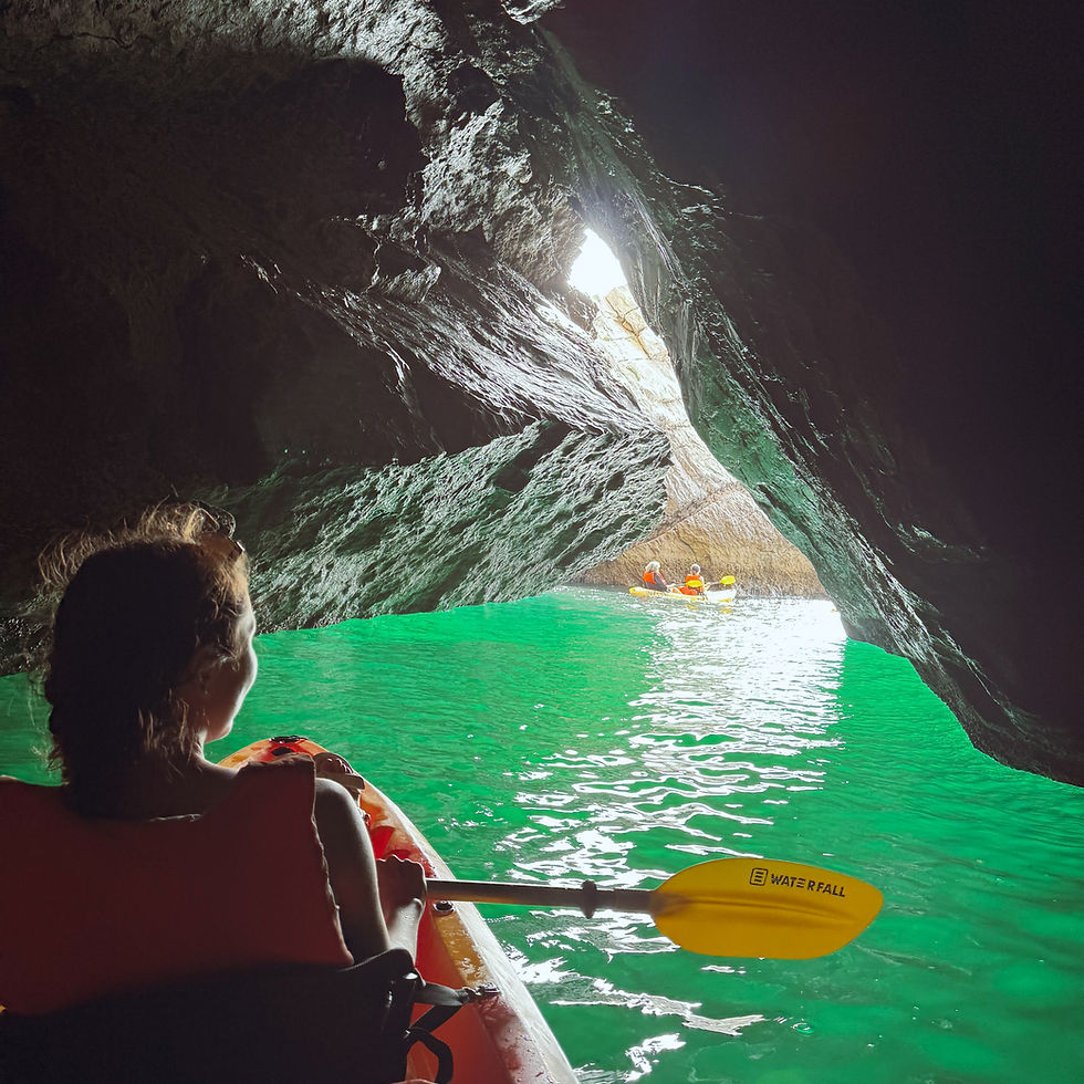 A solo traveler kayaking in Arrabida