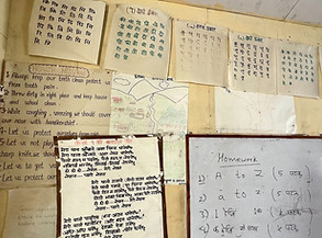 Paper teaching materials taped to the walls