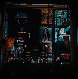 people walking on streets at nighttime_edited_edited.png