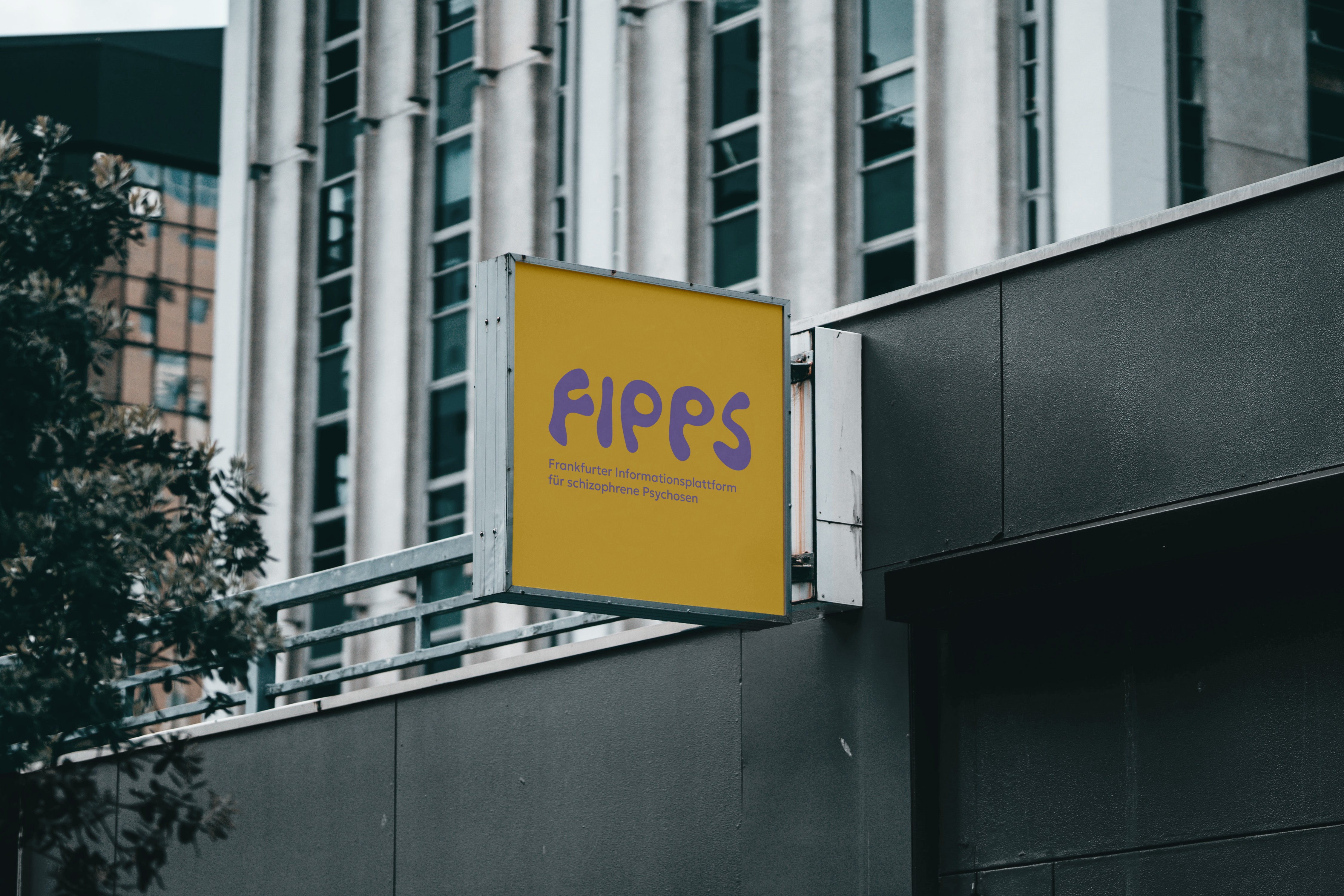 Sign on Building Mockup.png