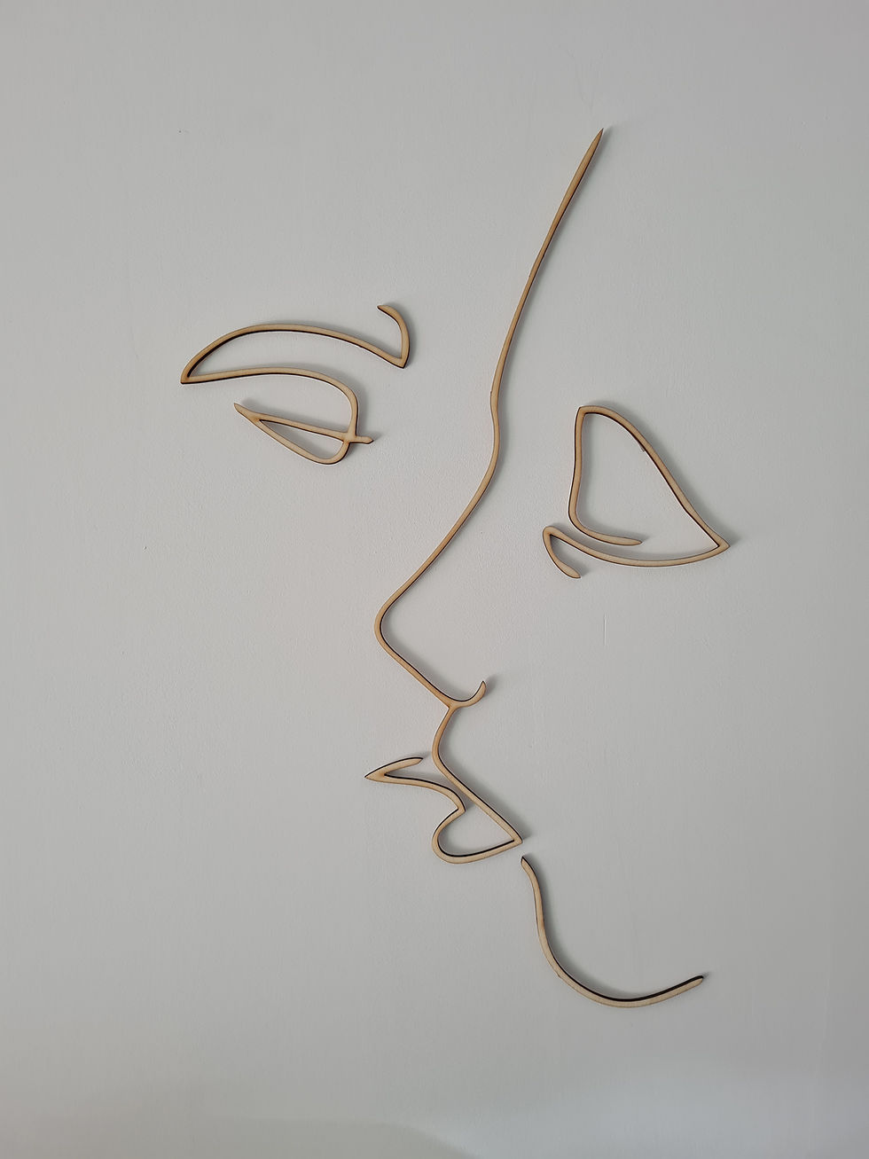Miniature : Dessin au trait de deux visages se touchant