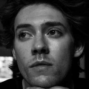 HEADSHOT_GREG-LARTIGUE.jpeg