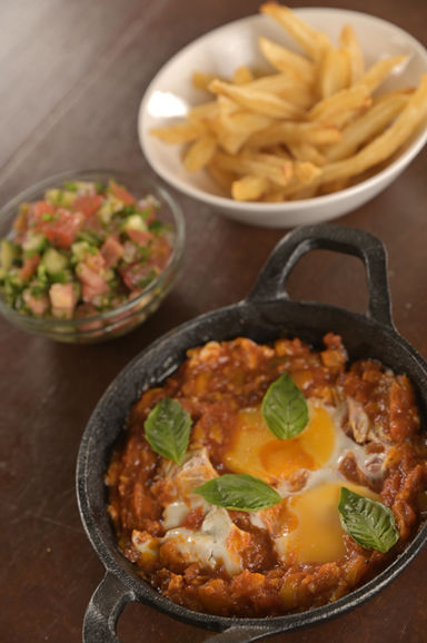 Kosher Shakshuka meal with French Fries and Israeli Salad