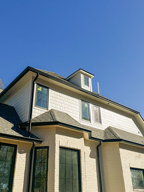 New black k-style gutters installed on new home in the Asheville NC area