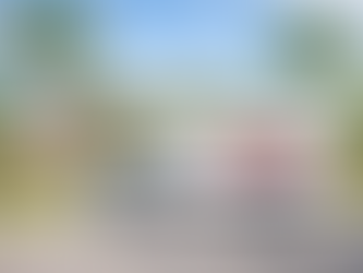 A-Class Moving & Storage moving truck outside of a house