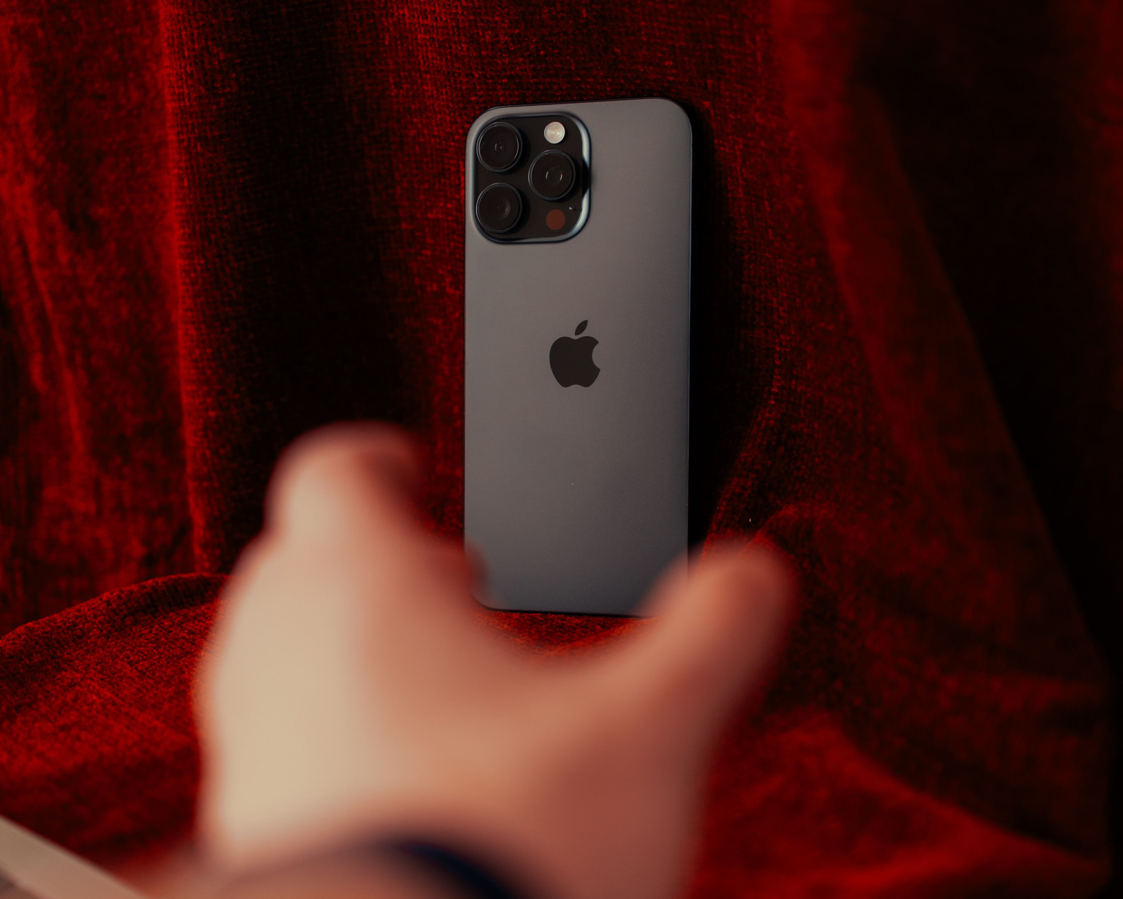 Person reaching for a phone
