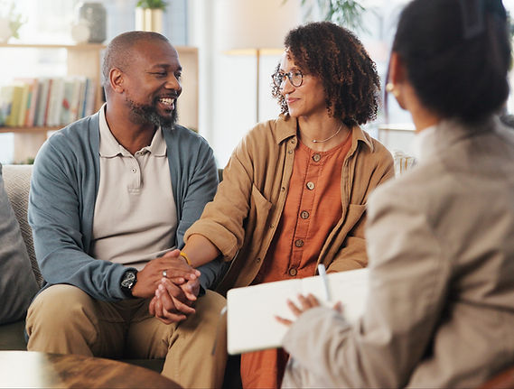 couple-in-therapy-session-with-counselor-in-home-