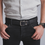 Thumbnail: Man in jeans wearing Cork Reversible Men's Belt showing black side