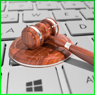 Computer Keyboard with legal gavel on top