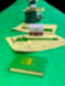 D. Earls tax Service table decorations at community event
