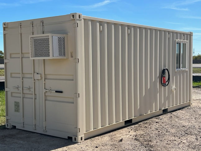 Beige shipping container office with air conditioner, window, and fire extinguisher.