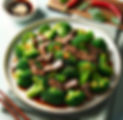 Beef and broccoli dish with sesame seeds on a plate Asian Bistro