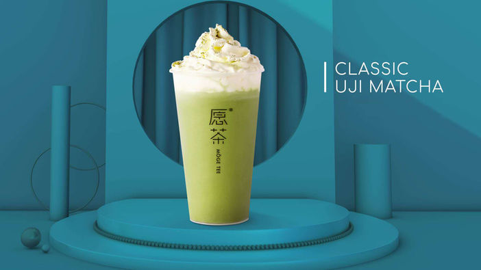 Classic uji matcha drink with whipped cream topping