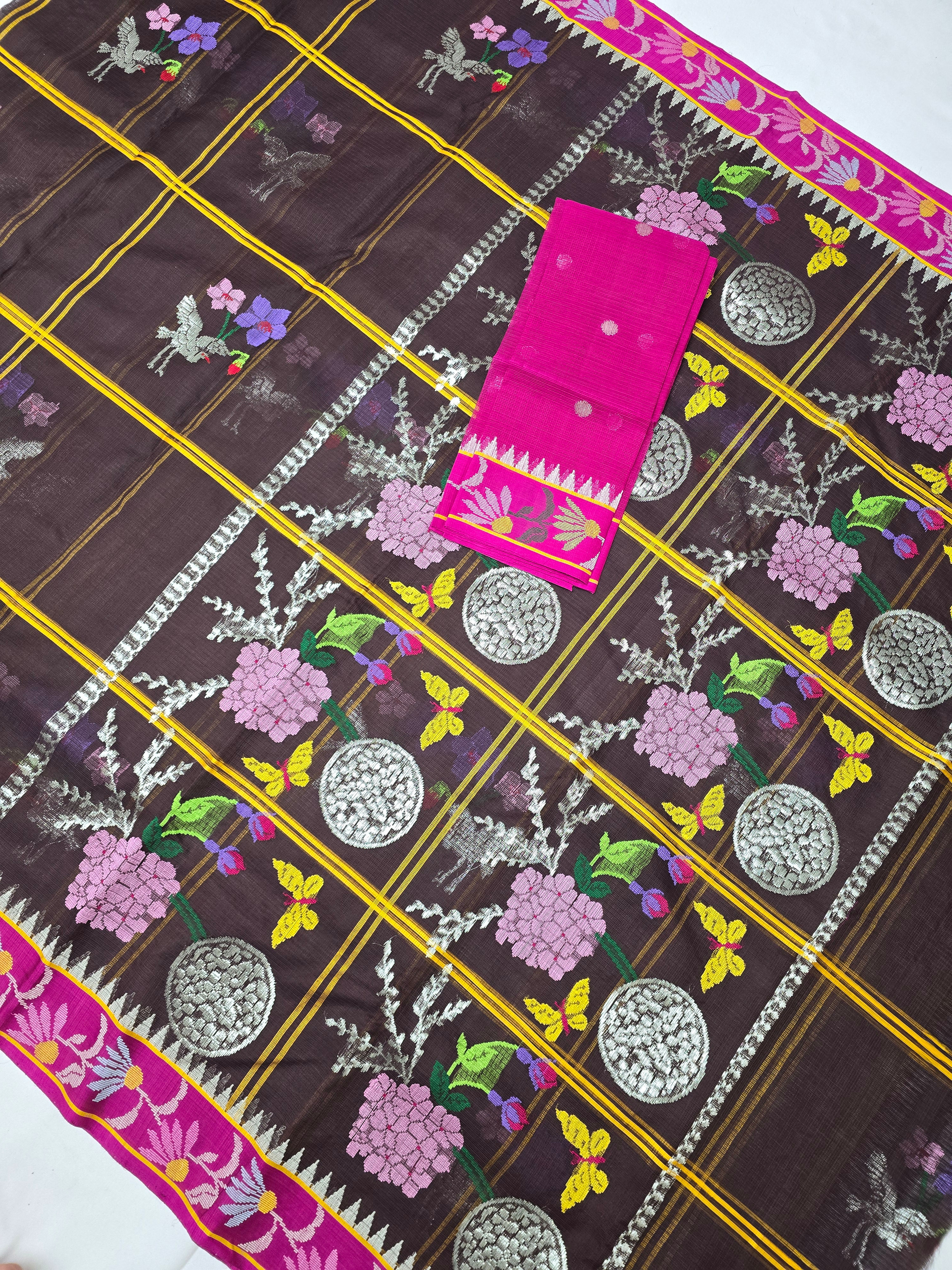 Kota Doria fabric with grid pattern, silver motifs, and pink embroidery