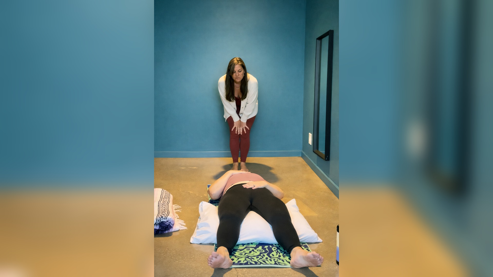 Heidi guiding a client through a breathwork session