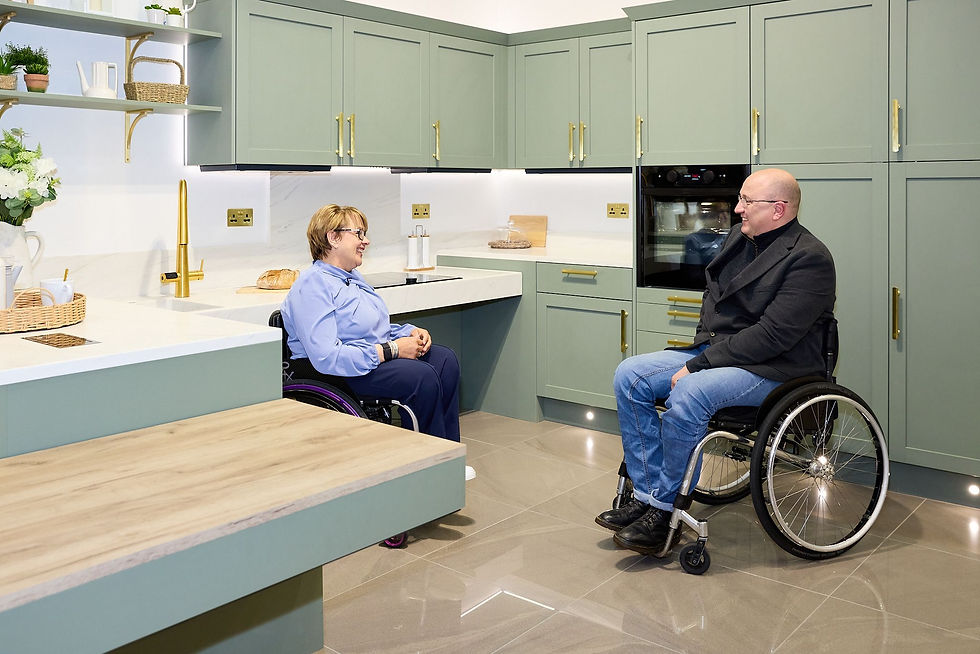 Image shows Tanni Grey-Thompson and Adam Thomas in the Freedom Kitchens soft green kitchen at the Symphony HW in South Yorkshire.