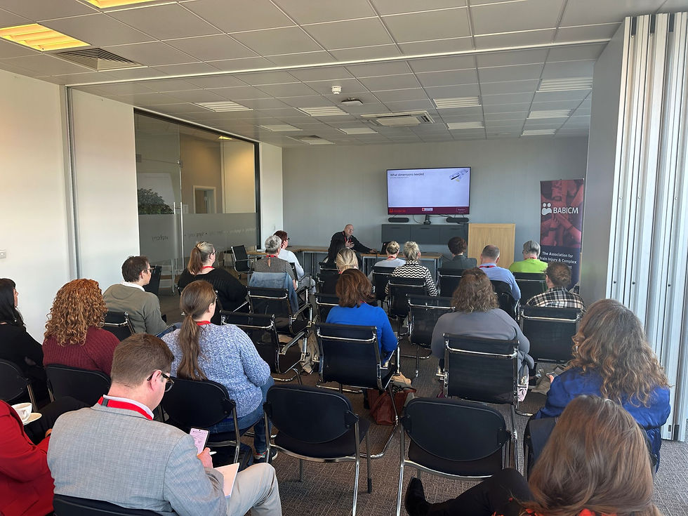 Image shows seated delegates watching a talk by Adam Thomas at a BABICM event at Symphony PLC in Barnsley.
