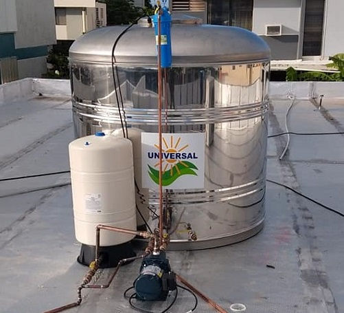Cisterna de agua de 600 galones instalada con sistema de bombeo de agua en vivienda de Puerto Rico