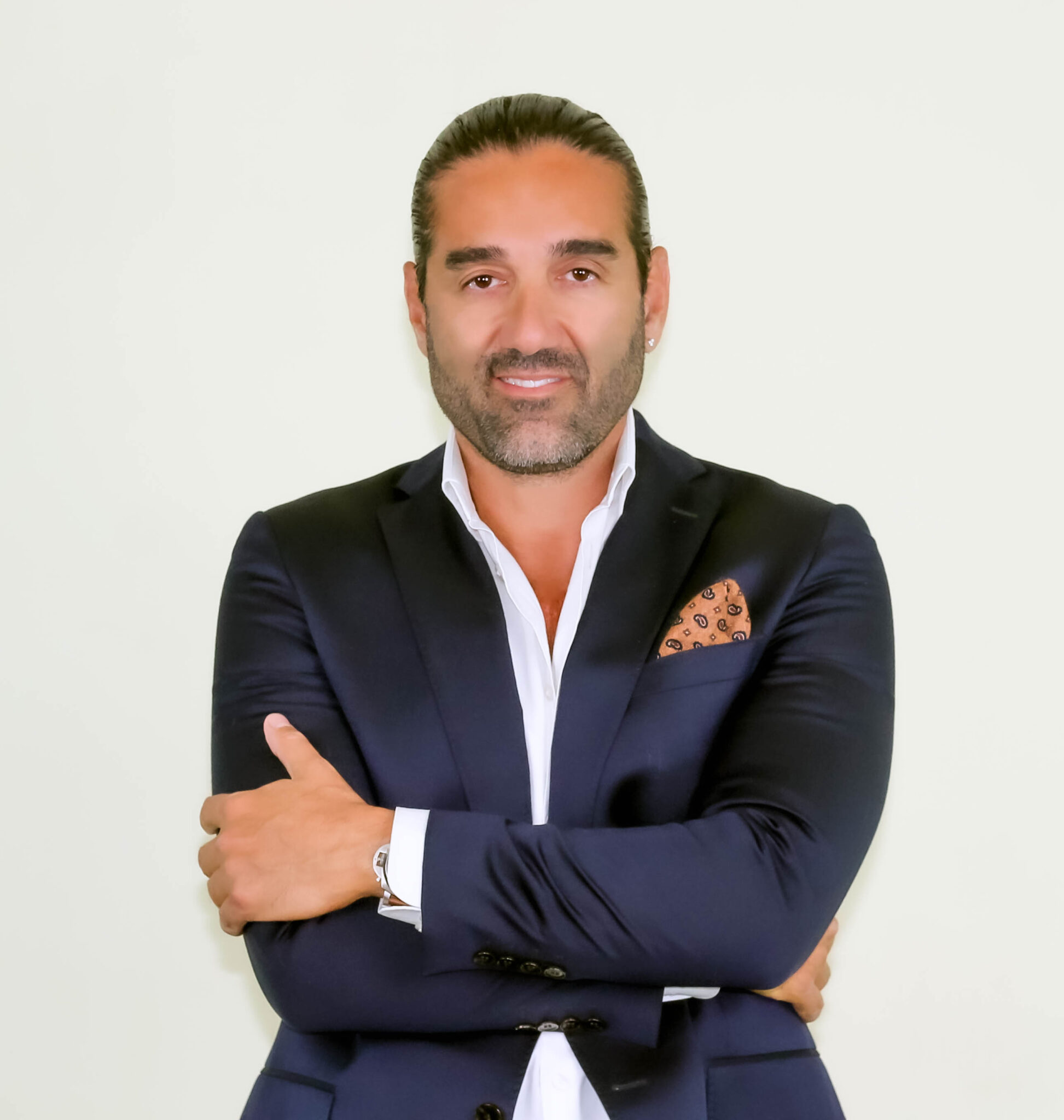 sotiris sotirious owner wearing suit