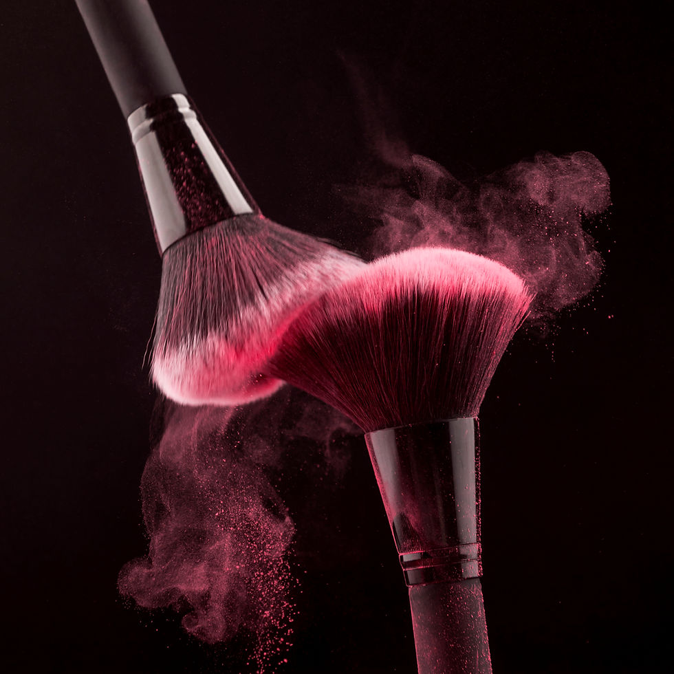makeup-brushes-with-whirling-pink-powder.jpg