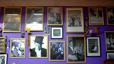 Frames with jazz musician pictures at the Prince of Greenwich, independent Greenwich pub in London.