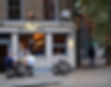 Facade with customers at Old China Hand, independent Clerkenwell pub, London.