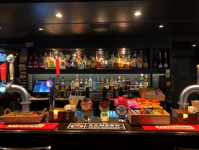 Bar with beer lines at the Rising Sun, independent pub in Belgravia, near Victoria