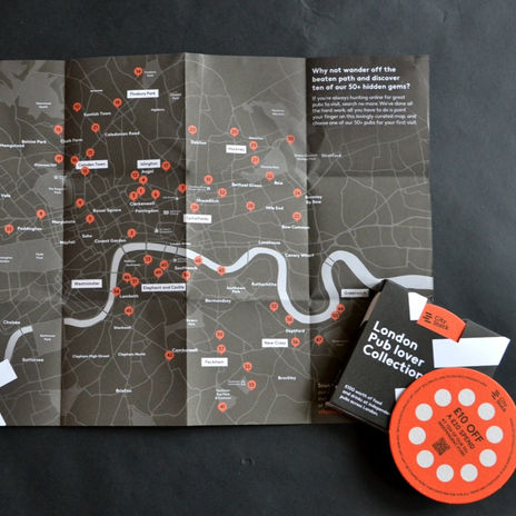 Map with pack of pub vouchers and special beer mat