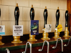 Beer pumps at the Pocket, independent pub in Islington, North London