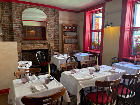 Pie room with tables and chairs at the Newman Arms, independent pub in Fitzrovia, central London