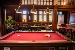 Pool table, hanging lamps at the Duke of Edinburgh, Brixton independent pub near Clapham, South West London