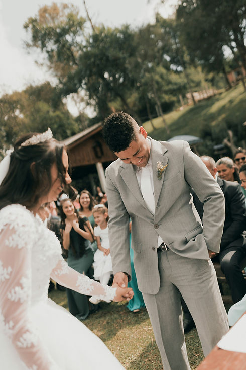 Couple laughing during wedding ceremony planned by Austin wedding planner Corinna